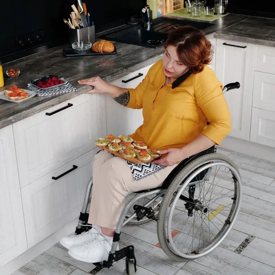 A participant making lunch at home