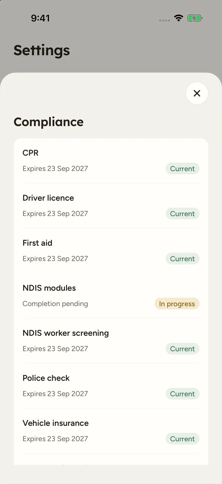 The worker Compliance page showing credential expiry dates and NDIS module completion.